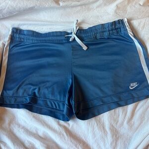 Blue Nike shorts with drawstring